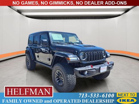 New 2026 Jeep Wrangler Unlimited Rubicon w/ Xtreme 35 Tire Package AWD/4WD image 1