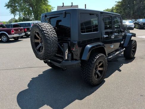 Used 2012 Jeep Wrangler Unlimited Sahara w/ Dual Top Group AWD/4WD image 19
