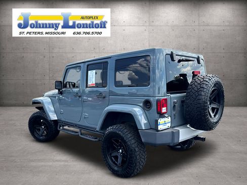 Used 2014 Jeep Wrangler Unlimited Sahara w/ Dual Top Group AWD/4WD image 3