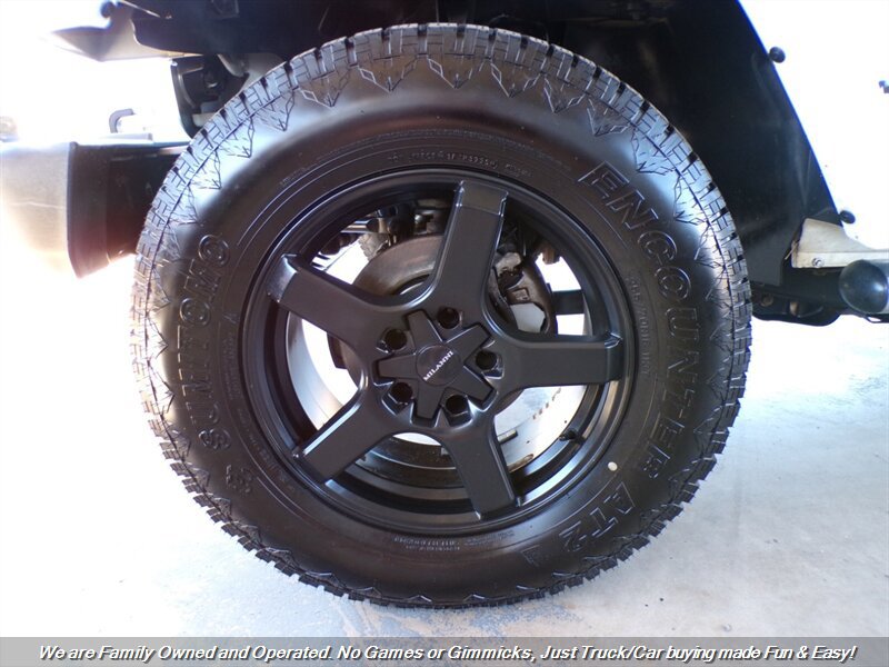 Used 2012 Jeep Wrangler Unlimited Sahara w/ Dual Top Group AWD/4WD image 34