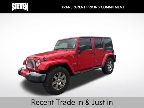 Used 2016 Jeep Wrangler Unlimited Sahara w/ Max Tow Package AWD/4WD image 1