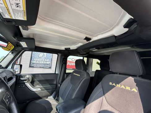 Used 2013 Jeep Wrangler Unlimited Sahara w/ Dual Top Group AWD/4WD image 20