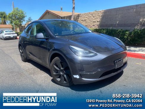 Used 2024 Tesla Model Y Long Range AWD/4WD image 1