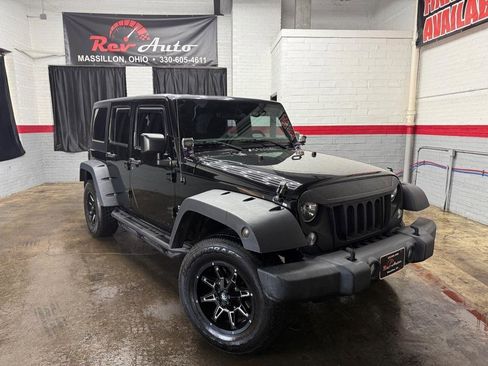 Used 2015 Jeep Wrangler Unlimited Sport image 1