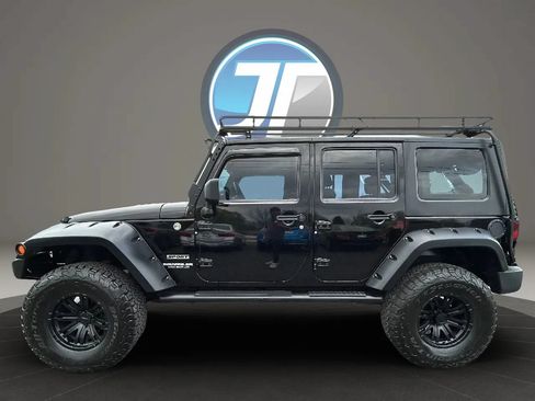 Used 2010 Jeep Wrangler Unlimited Sport w/ Trailer Tow Group AWD/4WD image 12