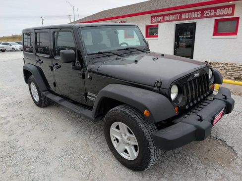 Used 2011 Jeep Wrangler Unlimited Sport image 1
