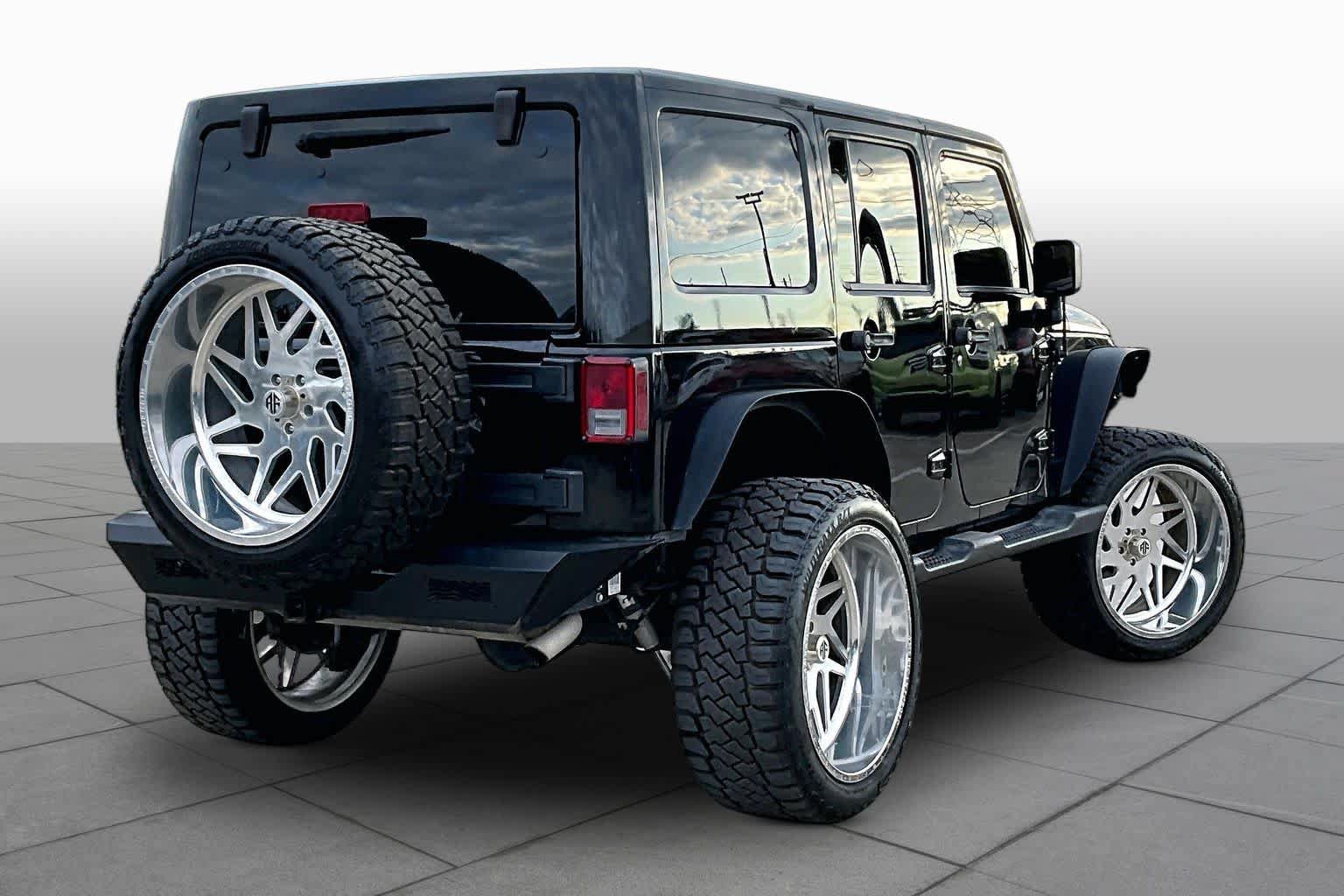 Used 2014 Jeep Wrangler Unlimited Sahara AWD/4WD image 13
