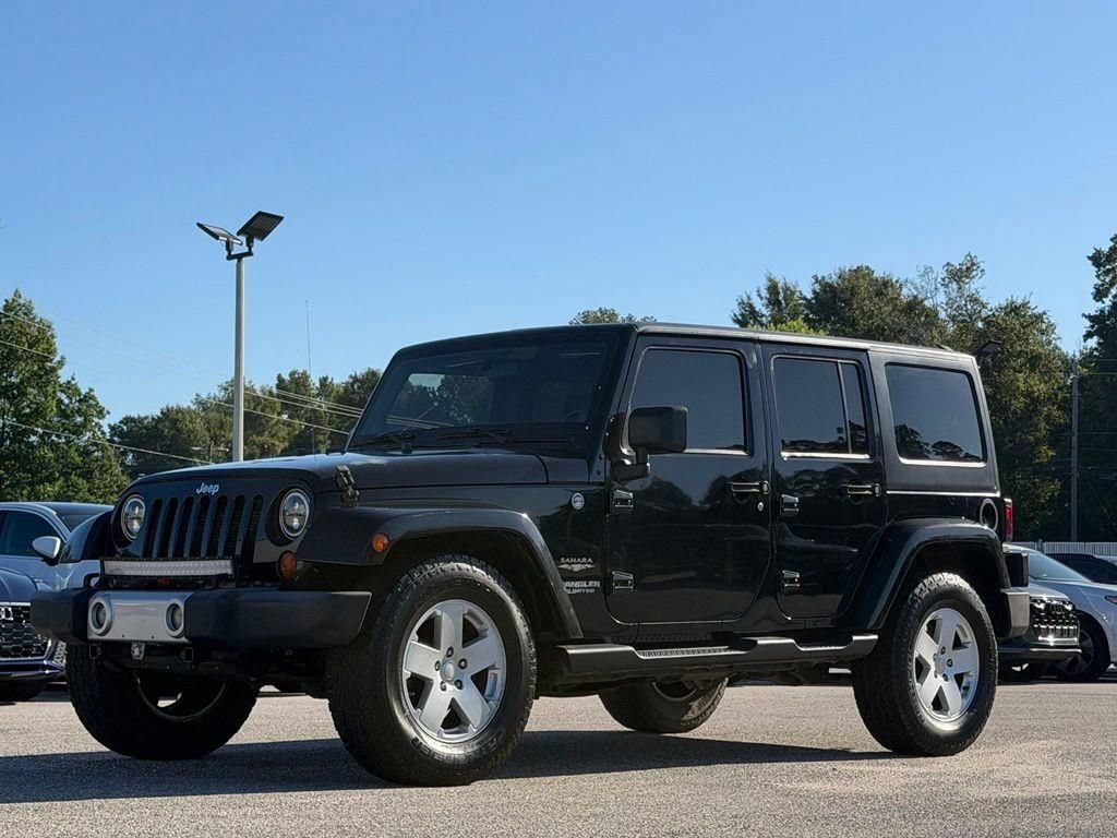 Used 2012 Jeep Wrangler Unlimited Sahara AWD/4WD image 8