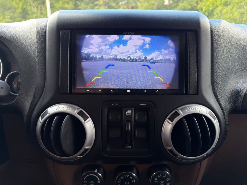 Used 2015 Jeep Wrangler Unlimited Sahara w/ Dual Top Group AWD/4WD image 18