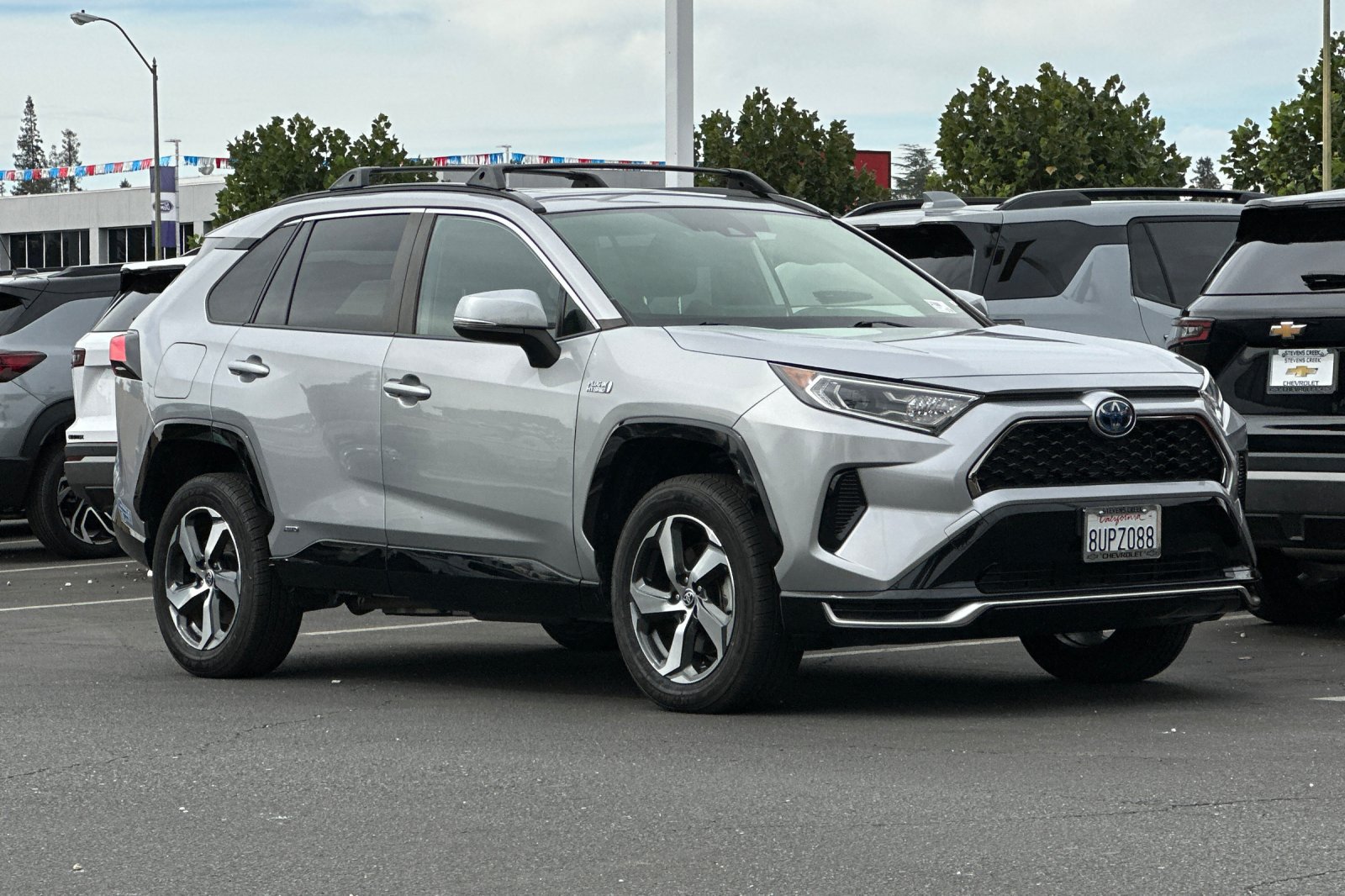 Used 2021 Toyota RAV4 SE w/ Weather & Moonroof Package AWD/4WD image 2