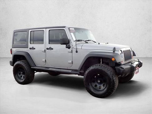 Used 2013 Jeep Wrangler Unlimited Sport w/ Mopar Black Appearance Group AWD/4WD image 6