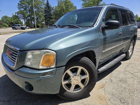 Used 2009 GMC Envoy SLE w/ Cargo Convenience Package AWD/4WD image 1