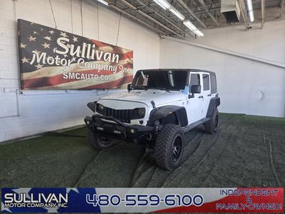 Used 2017 Jeep Wrangler Unlimited Sport w/ Mopar Black Appearance Group