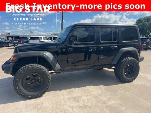 Used 2025 Jeep Wrangler Sport image 1