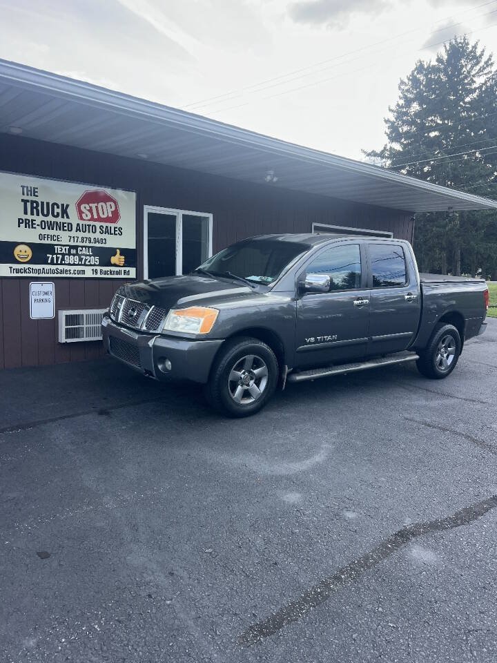 Used 2005 Nissan Titan SE w/ (W01) Utility Bed Pkg AWD/4WD image 1