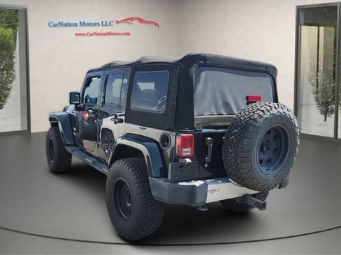 Used 2012 Jeep Wrangler Unlimited Sahara w/ Dual Top Group image 2