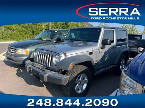 Used 2016 Jeep Wrangler Sport w/ Mopar Black Appearance Group AWD/4WD image 1