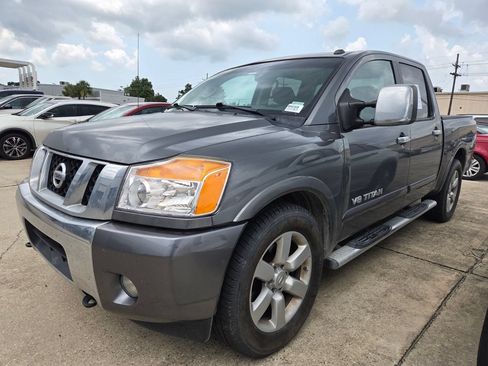 Used 2015 Nissan Titan SL w/ SL Max Utility Package RWD image 1