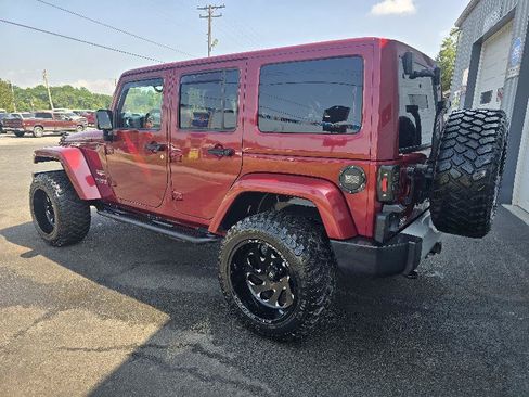 Used 2012 Jeep Wrangler Unlimited Sahara w/ Dual Top Group AWD/4WD image 4