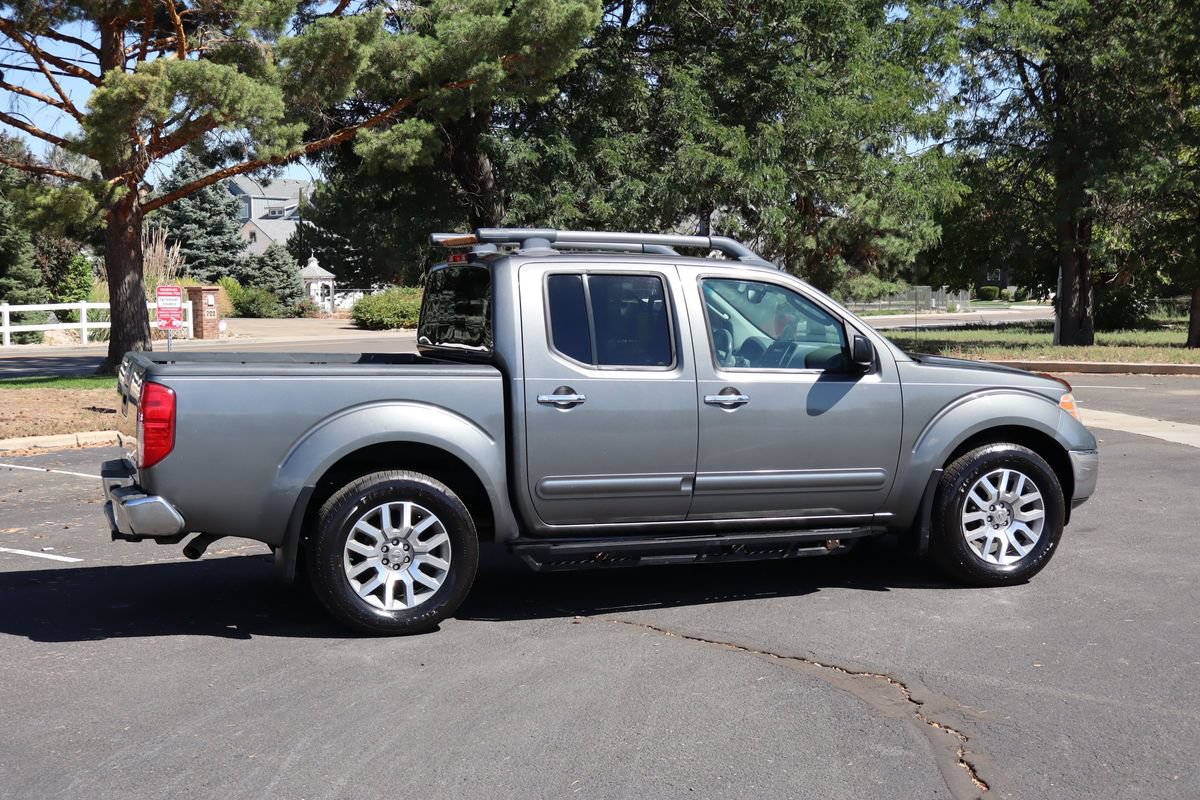 Used 2009 Nissan Frontier LE w/ LE Value Truck Pkg AWD/4WD image 4