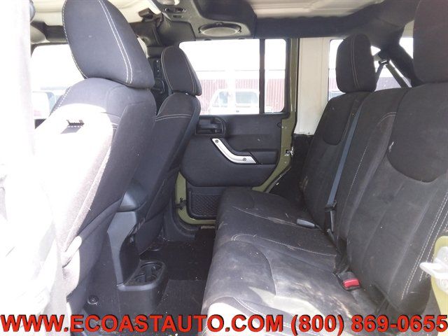 Used 2013 Jeep Wrangler Unlimited Sahara w/ Dual Top Group AWD/4WD image 12