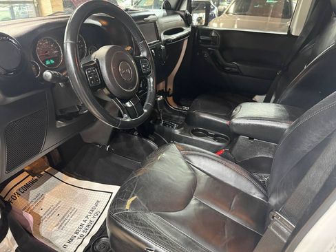 Used 2014 Jeep Wrangler Unlimited Sahara AWD/4WD image 16