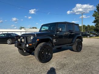 Used 2014 Jeep Wrangler Unlimited Sahara w/ Connectivity Group image 1