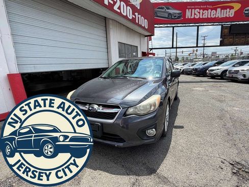 Used 2013 Subaru Impreza 2.0i Limited AWD/4WD image 1
