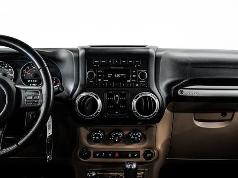 Used 2012 Jeep Wrangler Unlimited Rubicon w/ Dual Top Group AWD/4WD image 23