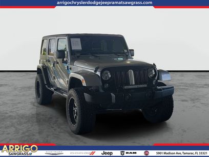 Used 2014 Jeep Wrangler Unlimited Sahara w/ Dual Top Group