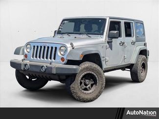 Used 2012 Jeep Wrangler Unlimited Sport image 1