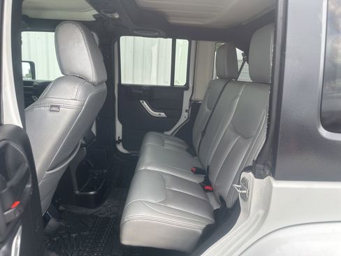 Used 2013 Jeep Wrangler Unlimited Sahara AWD/4WD image 12