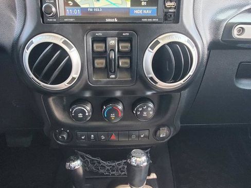 Used 2012 Jeep Wrangler Unlimited Sahara w/ Dual Top Group AWD/4WD image 10