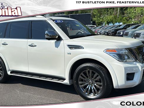 Certified 2019 Nissan Armada Platinum w/ Captain's Chairs Package AWD/4WD image 1