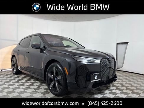 Used 2024 BMW iX xDrive50 w/ Premium Package AWD/4WD image 1