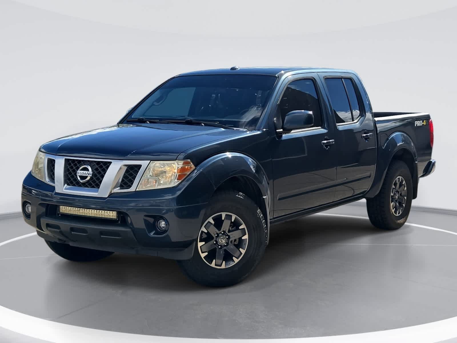 Used 2014 Nissan Frontier PRO-4X AWD/4WD image 1
