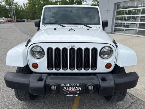 Used 2012 Jeep Wrangler Unlimited Sahara w/ Dual Top Group AWD/4WD image 12