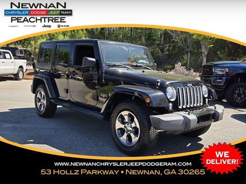 Used 2016 Jeep Wrangler Unlimited Sahara AWD/4WD image 1