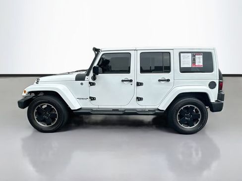 Used 2012 Jeep Wrangler Unlimited Sahara AWD/4WD image 9