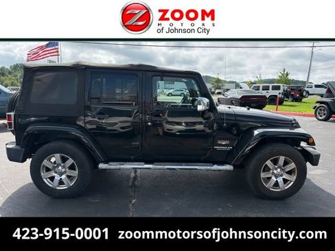 Used 2012 Jeep Wrangler Unlimited Sahara w/ Mopar Chrome Edition Group AWD/4WD image 1