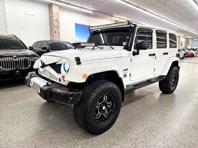 Used 2015 Jeep Wrangler Unlimited Sahara w/ Dual Top Group