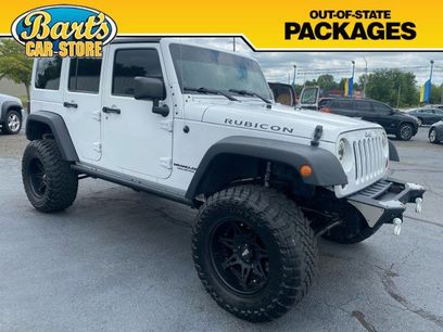 Used 2013 Jeep Wrangler Unlimited Rubicon w/ Dual Top Group
