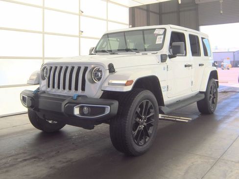 Used 2021 Jeep Wrangler Unlimited Sahara w/ Cold Weather Group image 1