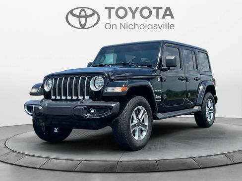 Used 2021 Jeep Wrangler Unlimited Sahara AWD/4WD image 1