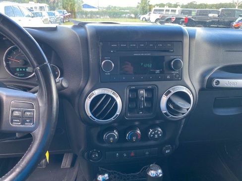 Used 2012 Jeep Wrangler Unlimited Sahara w/ Dual Top Group AWD/4WD image 30