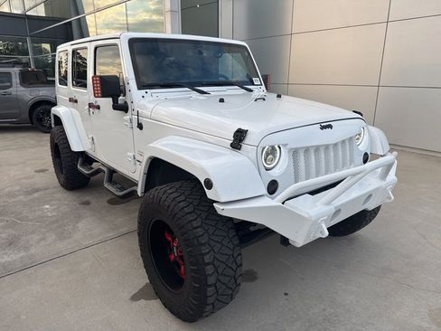 Used 2013 Jeep Wrangler Unlimited Sahara w/ Connectivity Group image 1