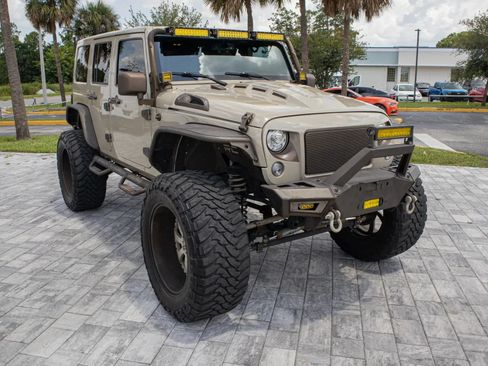 Used 2017 Jeep Wrangler Unlimited Sahara AWD/4WD image 1