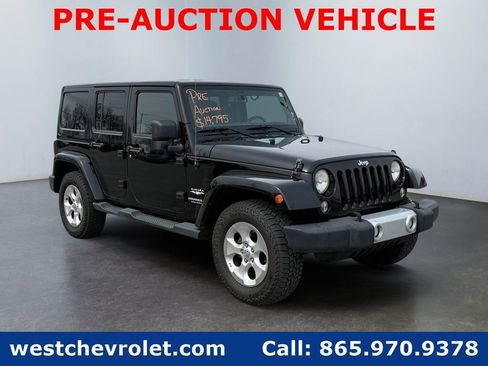 Used 2014 Jeep Wrangler Unlimited Sahara w/ Max Tow Package image 1
