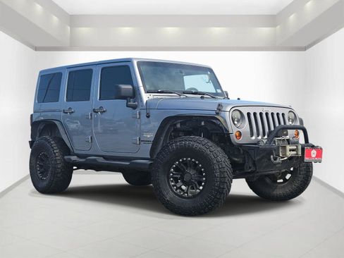 Used 2013 Jeep Wrangler Unlimited Sahara w/ Dual Top Group image 1