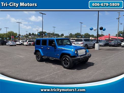 Used 2014 Jeep Wrangler Unlimited Sahara AWD/4WD image 1